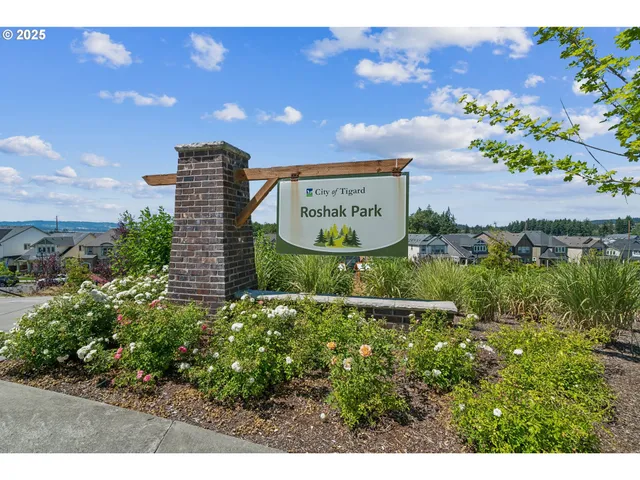 a sign that is on a brick wall