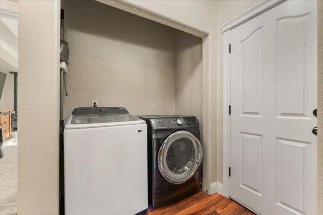 a view of a kitchen from the kitchen and a window