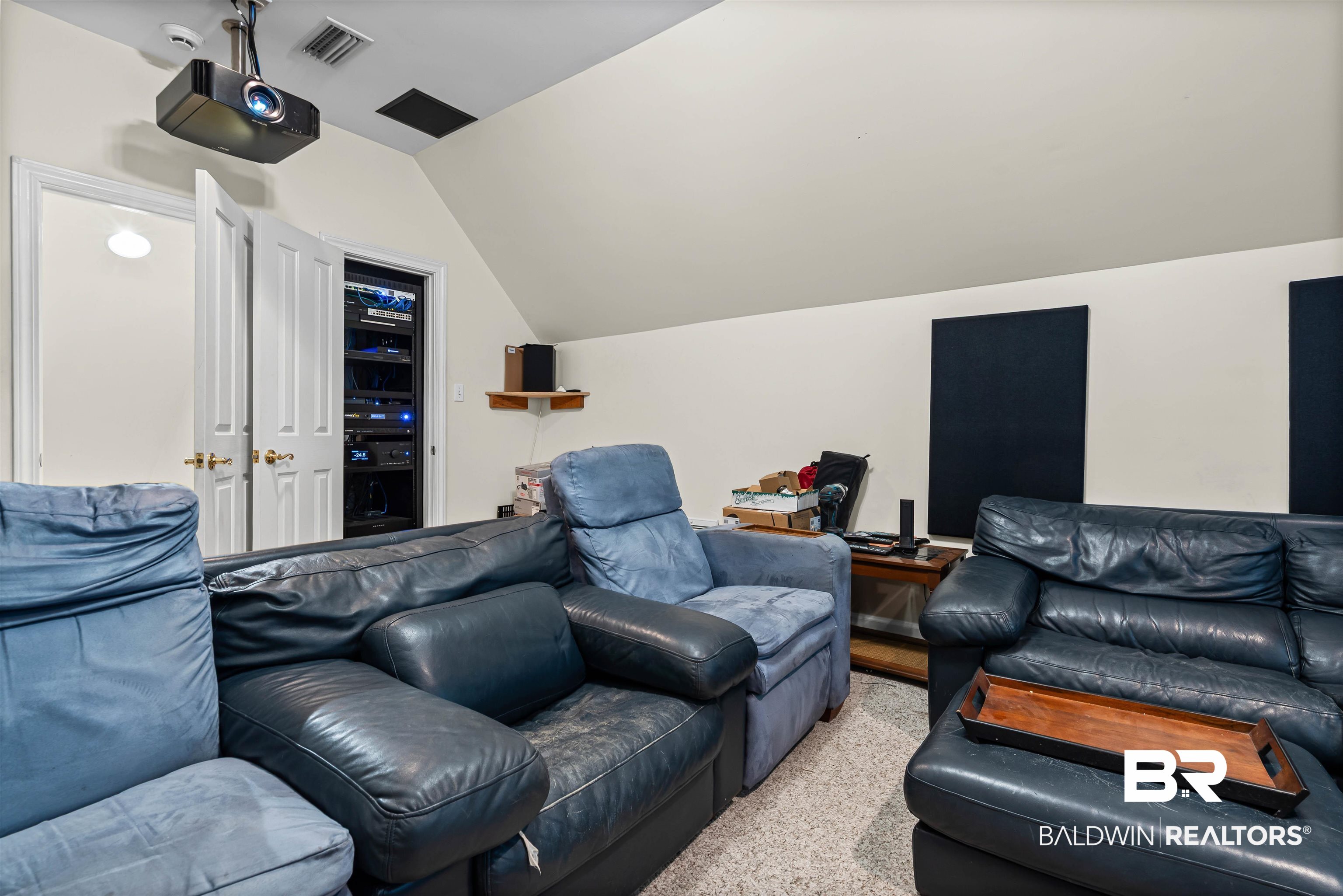 107 Beaver Dam Road Fairhope, AL 36532 - Photo 7 of 45 Cinema with vaulted ceiling and carpet floors