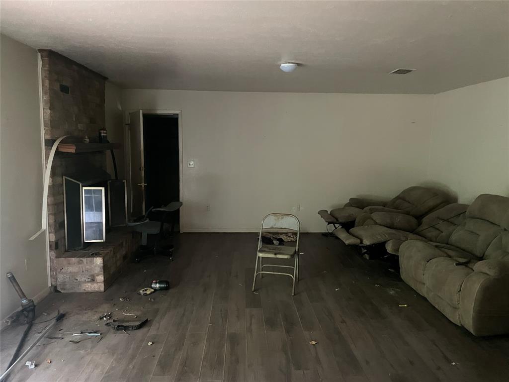 188 Pryor Street Rusk, TX 75785 - Photo 11 of 22 a living room with furniture rug and wooden floor