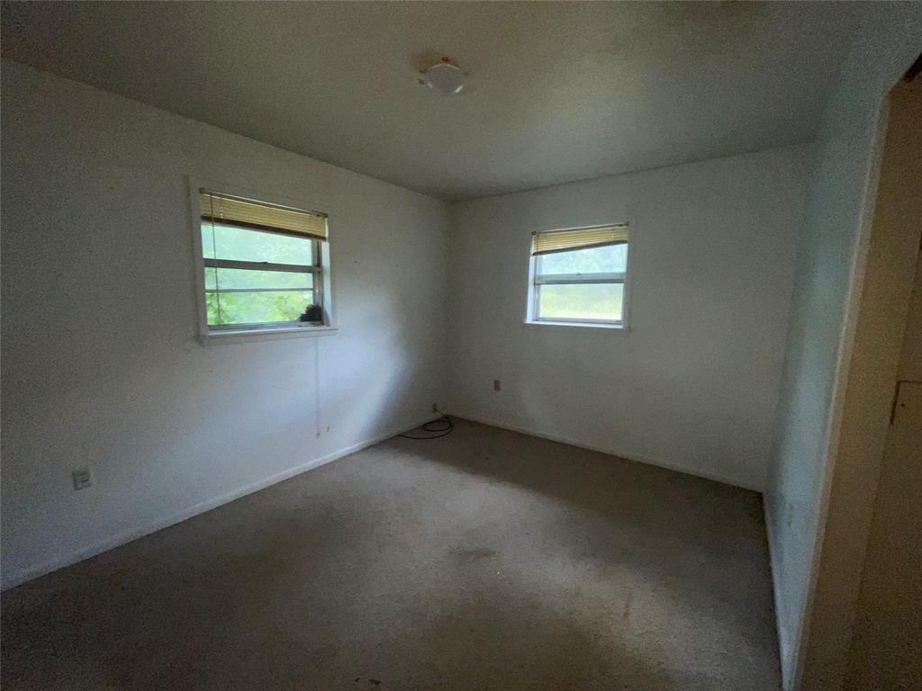 188 Pryor Street Rusk, TX 75785 - Photo 16 of 22 an empty room with windows