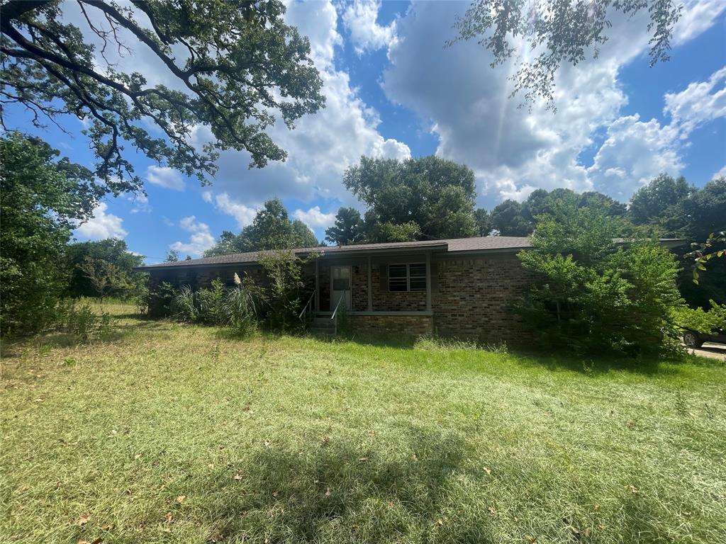 188 Pryor Street Rusk, TX 75785 - Photo 2 of 22 a view of a backyard