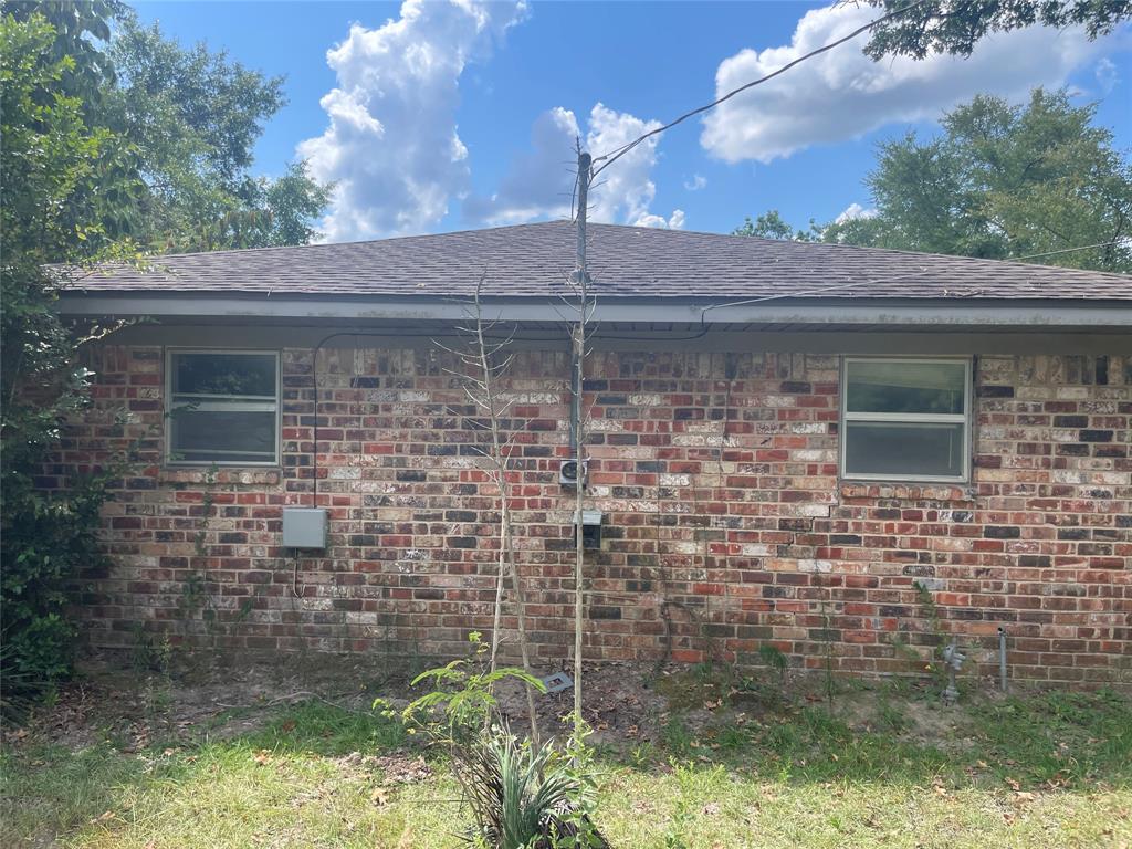 188 Pryor Street Rusk, TX 75785 - Photo 4 of 22 a brick house with a yard