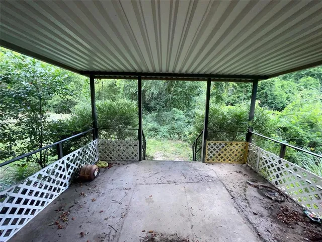 a garden view with a seating space