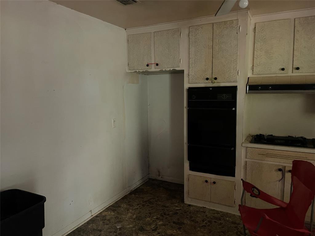 188 Pryor Street Rusk, TX 75785 - Photo 9 of 22 a view of cabinets and wooden floor