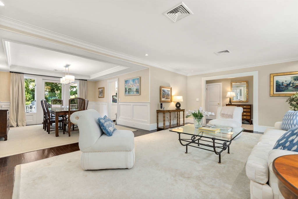 10 Ruane Road Newton, MA 02465 - Photo 3 of 35 a living room with furniture and a table