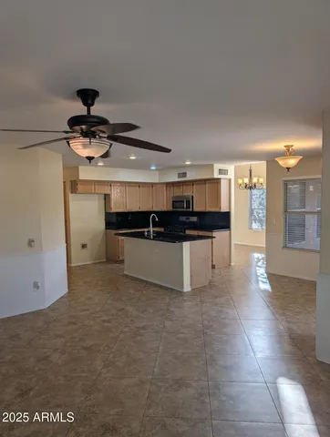 a view of a kitchen with a sink