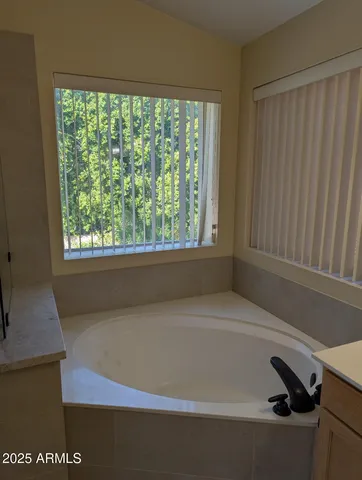 a bathroom with a bathtub
