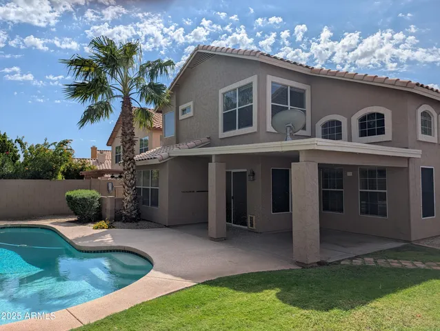 a house view with a garden space