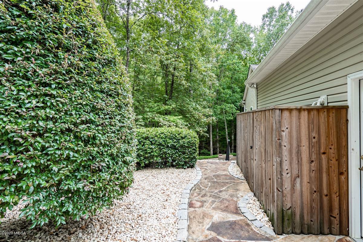 1934 Reedy Creek Road Forsyth, GA 31029 - Photo 18 of 51 a view of a wooden fence
