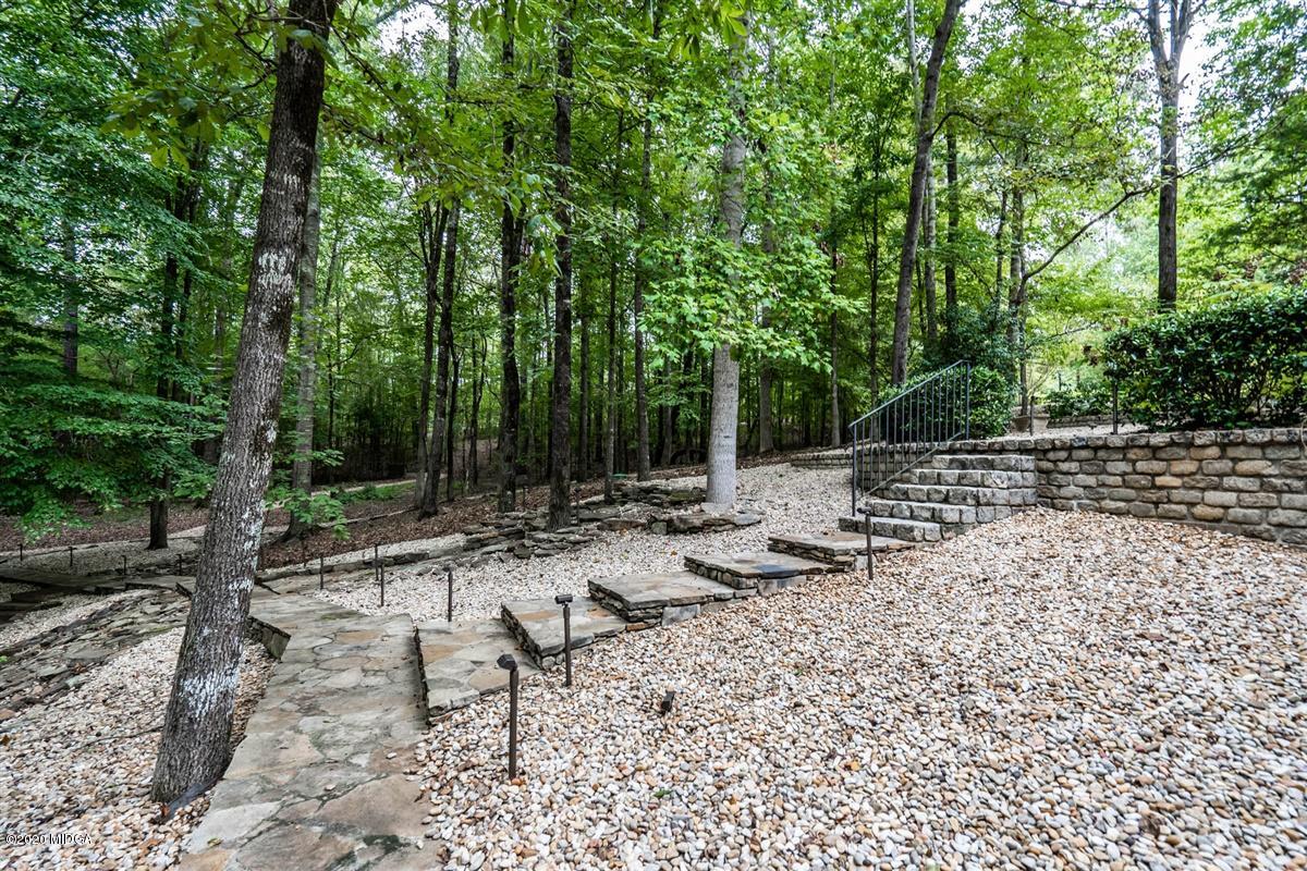 1934 Reedy Creek Road Forsyth, GA 31029 - Photo 26 of 51 a view of backyard with a table and chairs