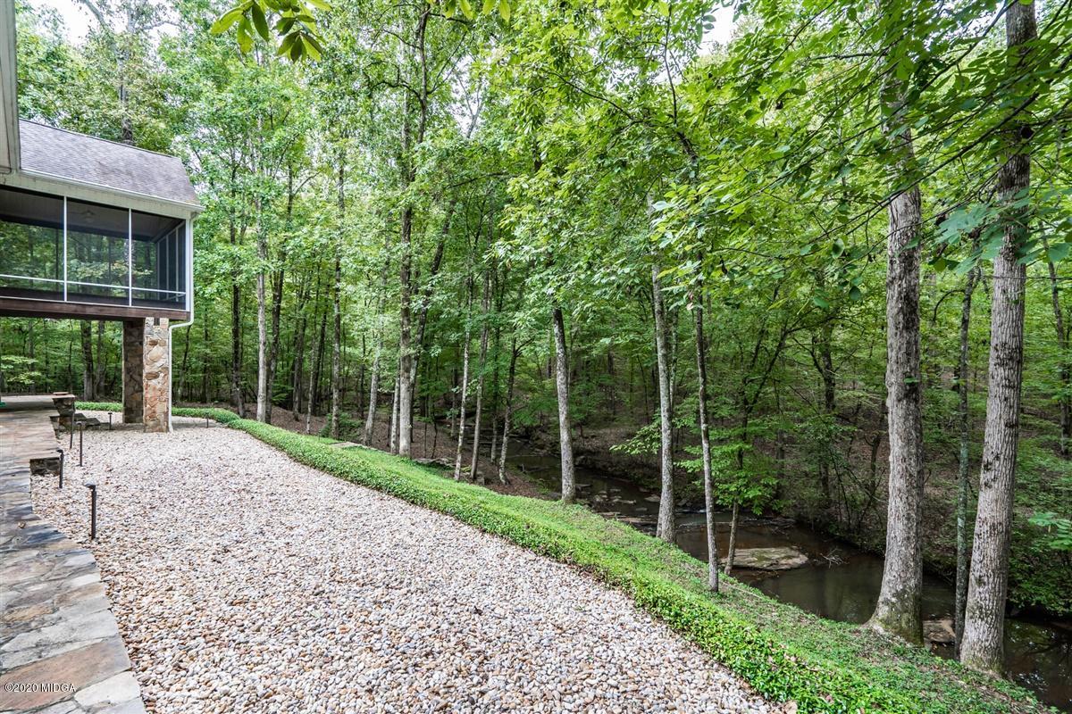 1934 Reedy Creek Road Forsyth, GA 31029 - Photo 28 of 51 a view of a backyard with a garden