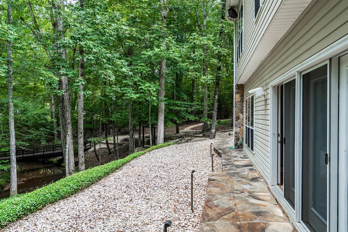 1934 Reedy Creek Road Forsyth, GA 31029 - Photo 32 of 51 a view of backyard with green space