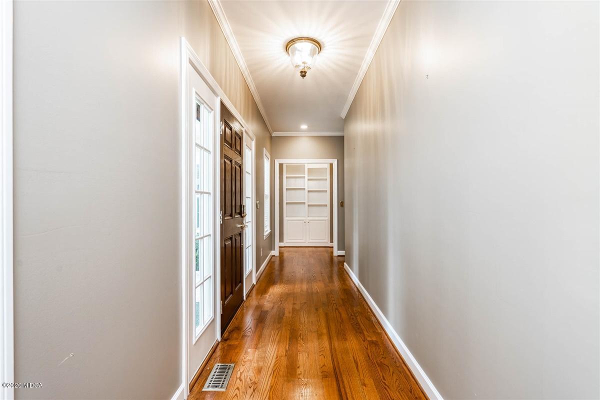 1934 Reedy Creek Road Forsyth, GA 31029 - Photo 43 of 51 a view of a hallway with wooden floor