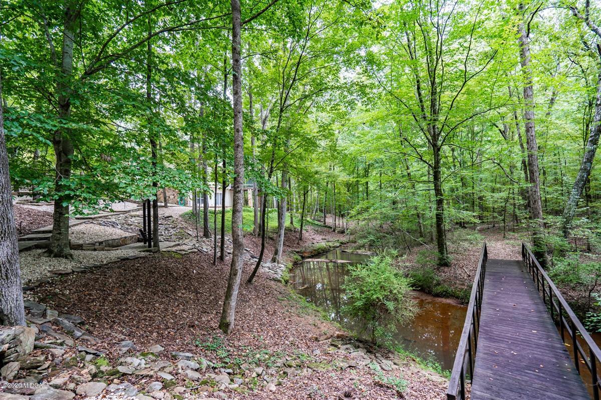 1934 Reedy Creek Road Forsyth, GA 31029 - Photo 10 of 51 a view of a backyard with chairs
