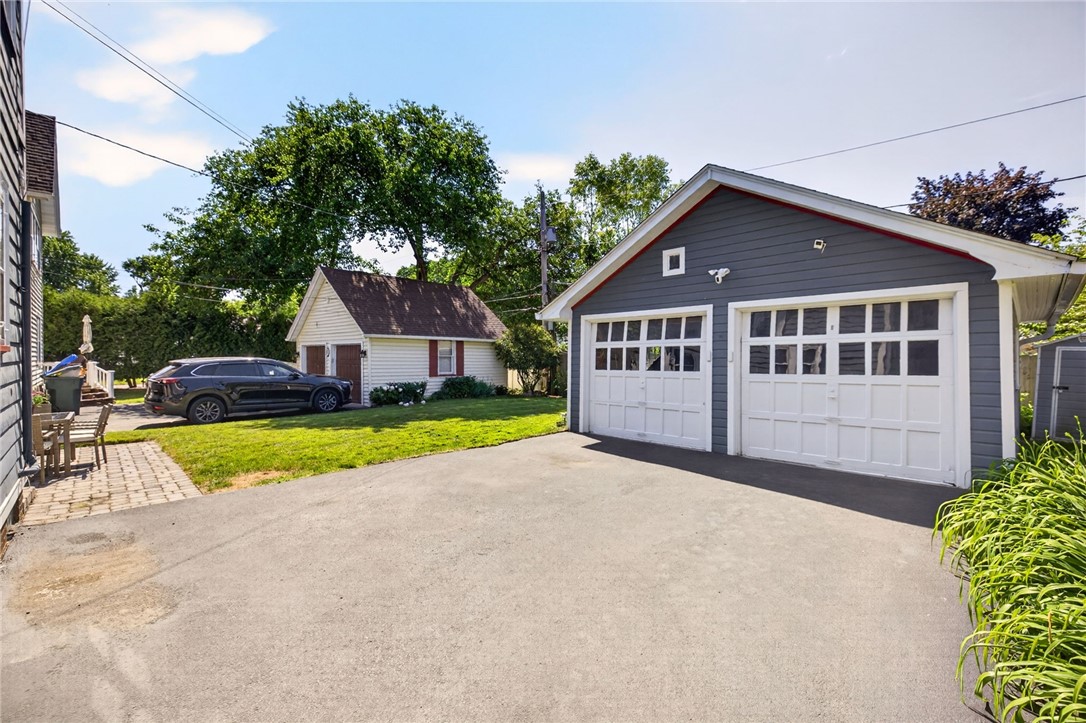 29 Elmcroft Road Rochester, NY 14609 - Photo 36 of 42 2 car detached garage & shed offer additional stor