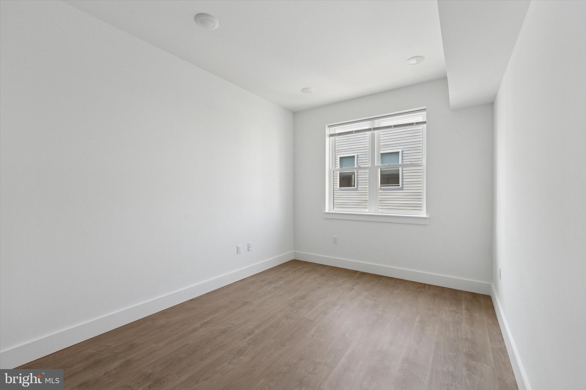 2520 North Front Street, Unit 403 Philadelphia, PA 19133 - Photo 3 of 8 an empty room with a window