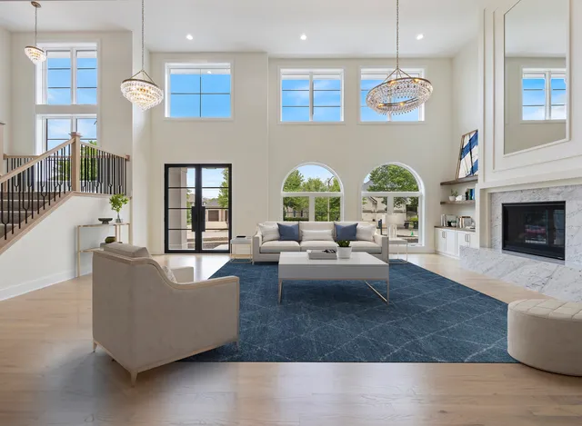 a view of a kitchen with a sink and a large window