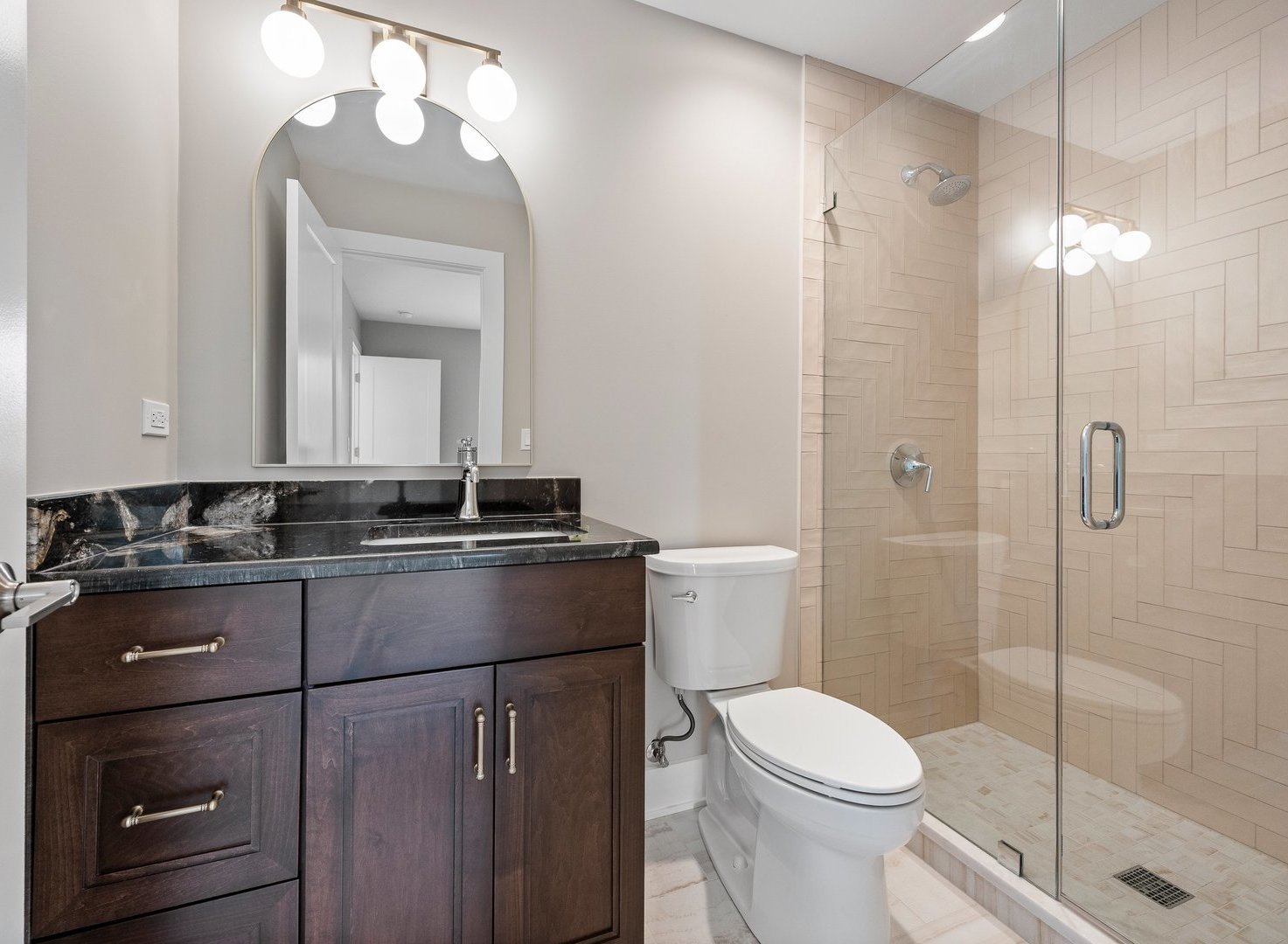 8886 Johnston Road Burr Ridge, IL 60527 - Photo 37 of 71 a bathroom with a sink a toilet and shower