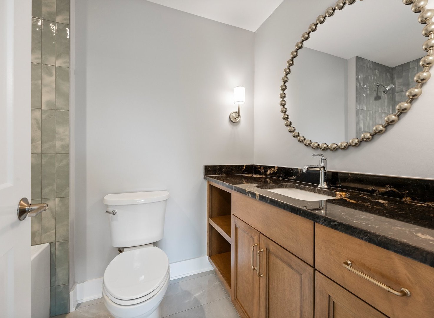 8886 Johnston Road Burr Ridge, IL 60527 - Photo 41 of 71 a bathroom with a granite countertop toilet sink and mirror