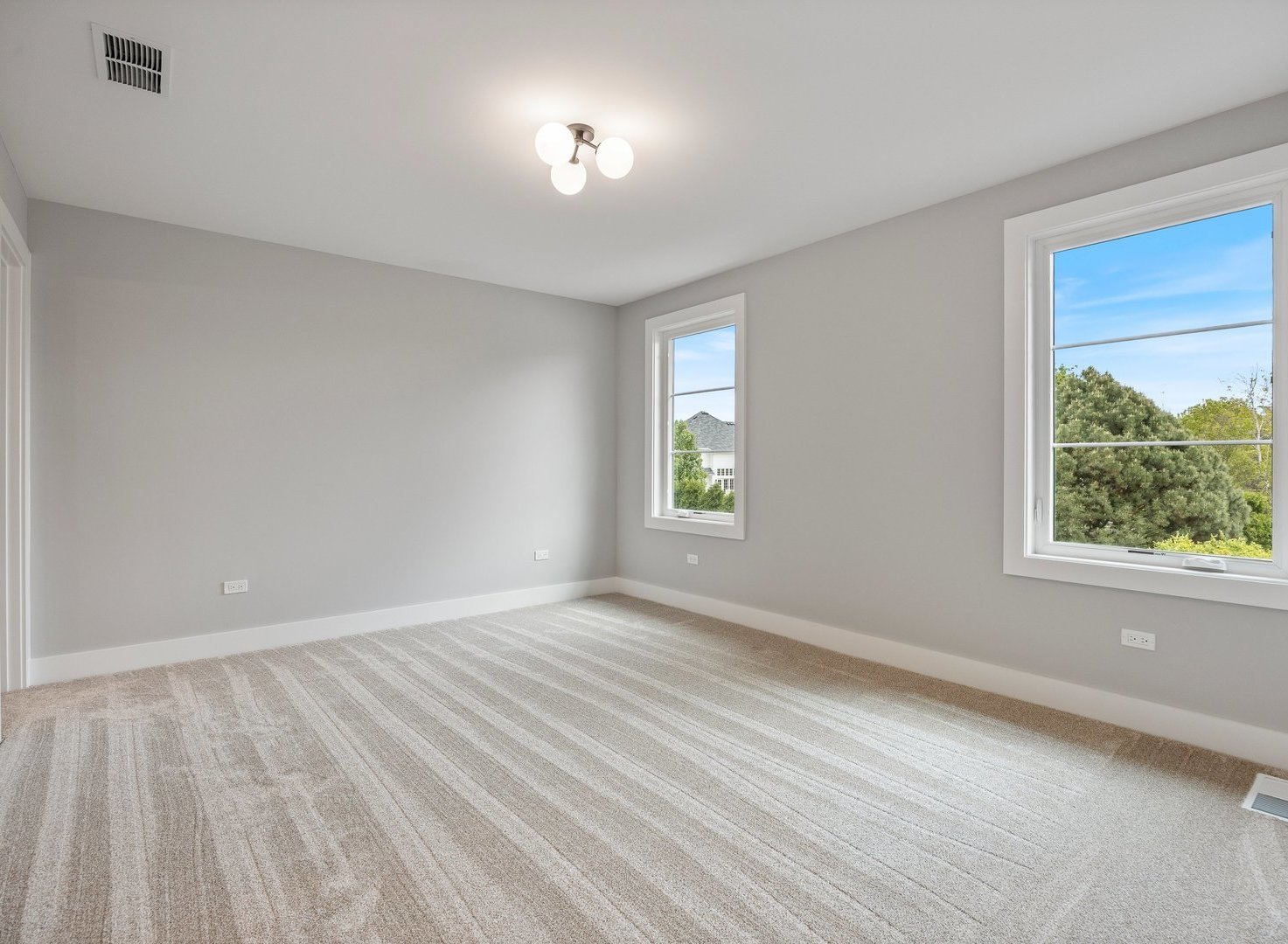 8886 Johnston Road Burr Ridge, IL 60527 - Photo 43 of 71 a view of an empty room with a window and wooden floor