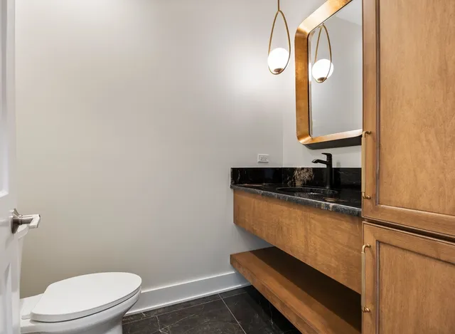 a room with furniture and flat screen tv