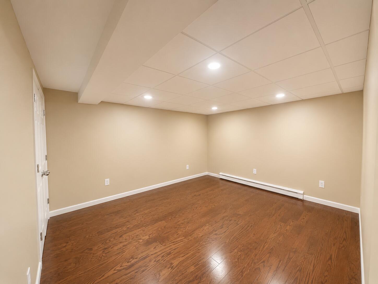 2612 Amsterdam Road Villa Hills, KY 41017 - Photo 30 of 52 OFFICE WITH WALK-IN CLOSET FEATURING BEAUTIFUL CUSTOM OPOXY FLOORING AND RECESSED LIGHTING - BASEMENT