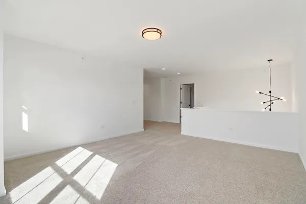 a bathroom with a double vanity sink toilet and a mirror