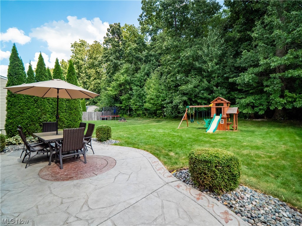 5319 Otten Road North Ridgeville, OH 44039 - Photo 28 of 33 View of patio featuring a trampoline and a playground