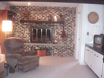 4948 Brookview Road Rockford, IL 61107 - Photo 3 of 5 a living room with furniture and a fireplace