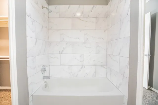 a bathroom with a bathtub