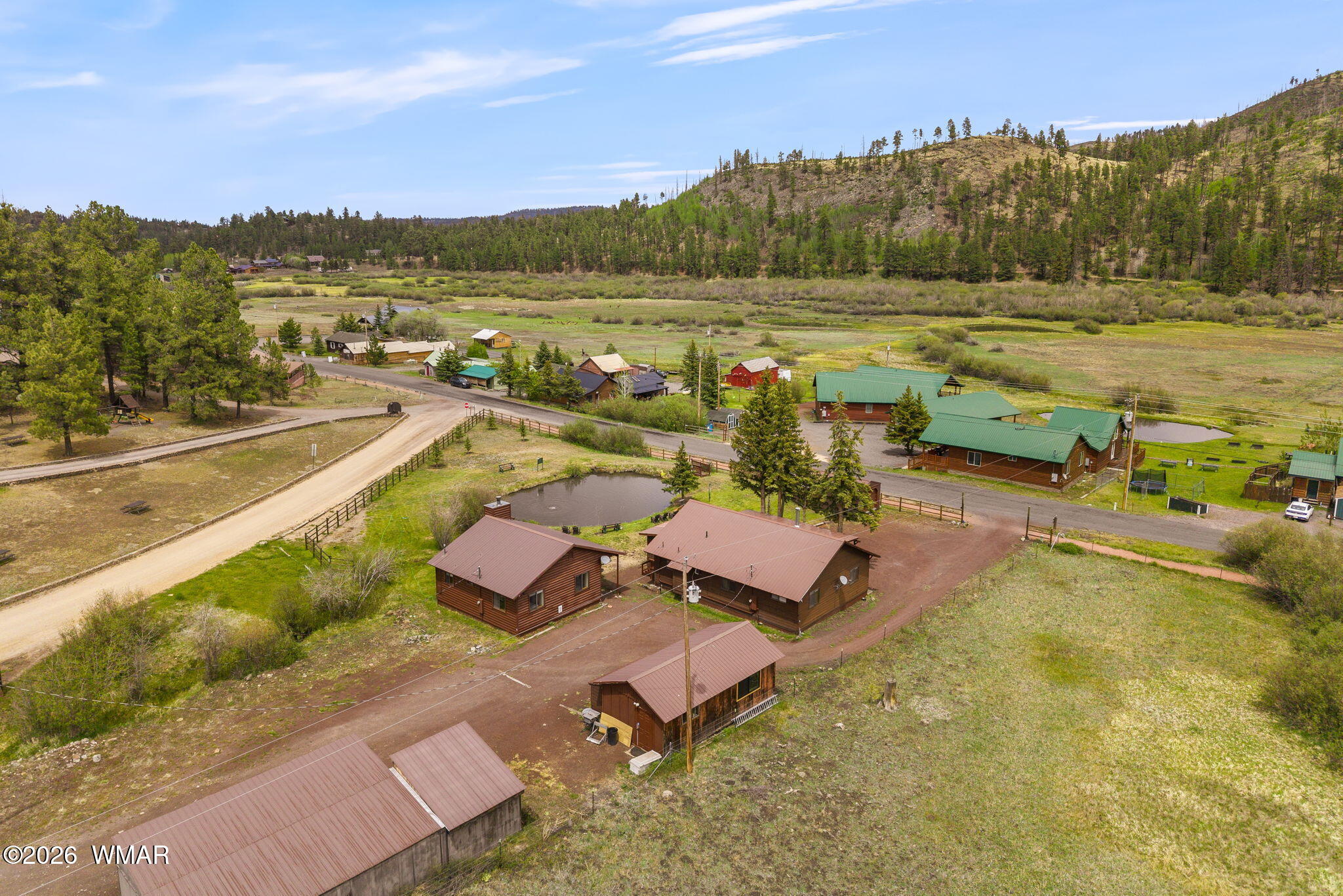 85 Main Street Greer, AZ 85927 - Photo 49 of 55 a view of a lake with a yard