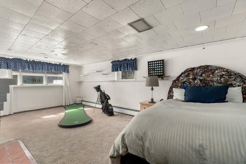 242 Old Stonebridge Road Wayland, MA 01778 - Photo 15 of 19 a bedroom with a bed and a couch