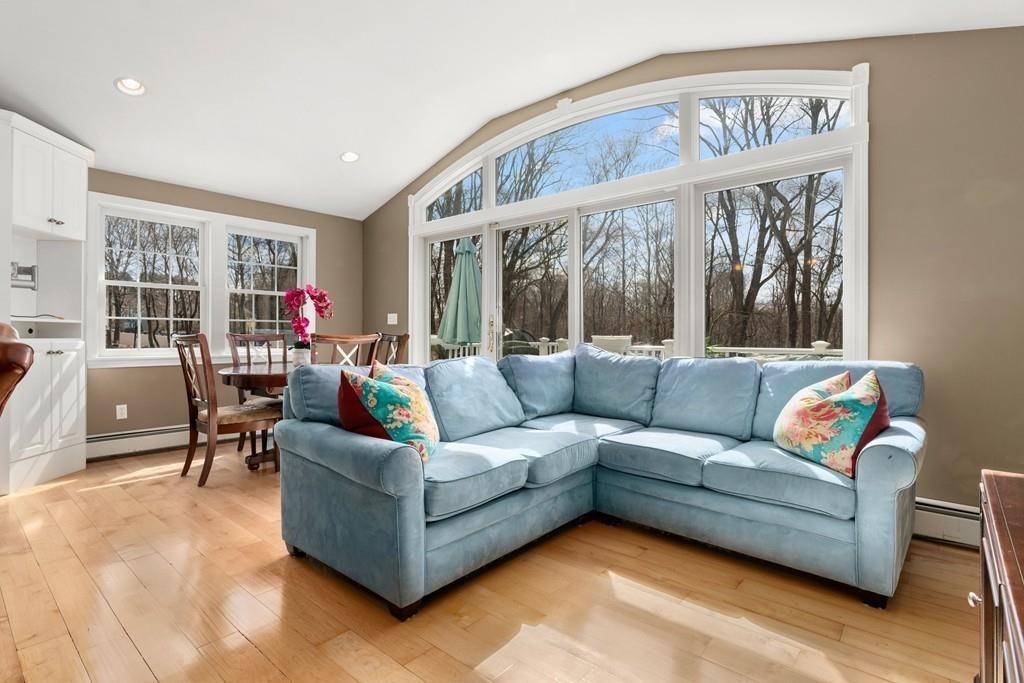 242 Old Stonebridge Road Wayland, MA 01778 - Photo 8 of 19 a living room with furniture and a large window