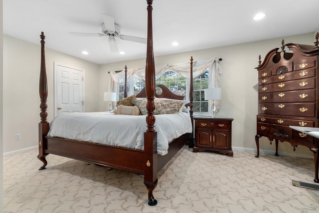 242 Old Stonebridge Road Wayland, MA 01778 - Photo 10 of 19 a bedroom with a bed dresser and a window