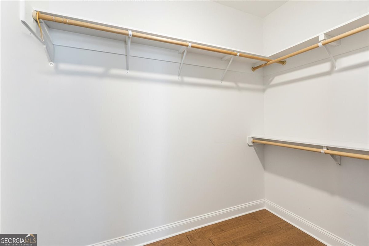 731 Markhams Drive Madison, GA 30650 - Photo 25 of 68 a view of a room with racks on the wall