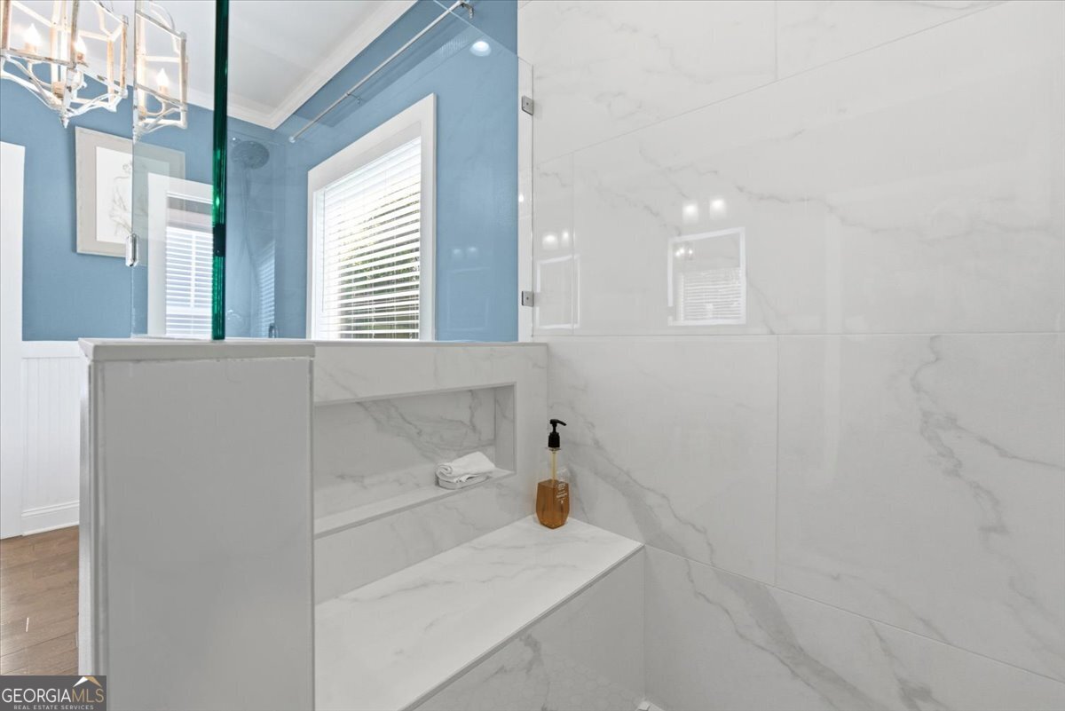 731 Markhams Drive Madison, GA 30650 - Photo 34 of 68 a bathroom with a sink and a window