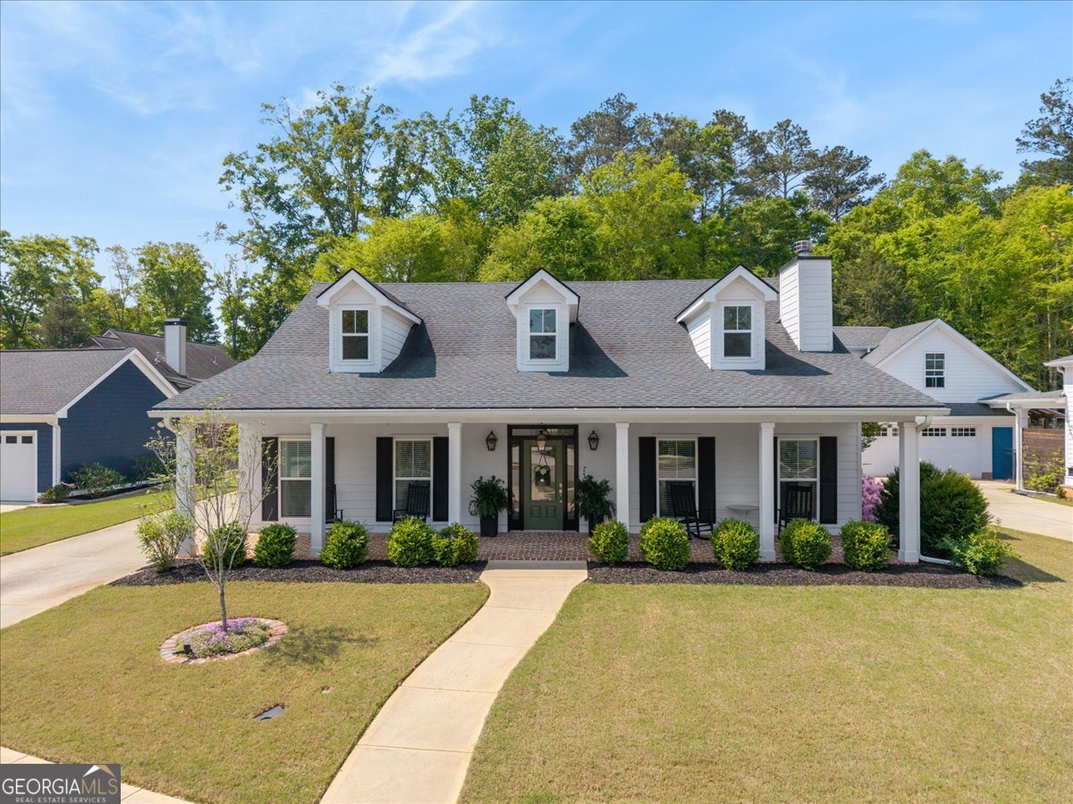 731 Markhams Drive Madison, GA 30650 - Photo 58 of 68 front view of house with a yard