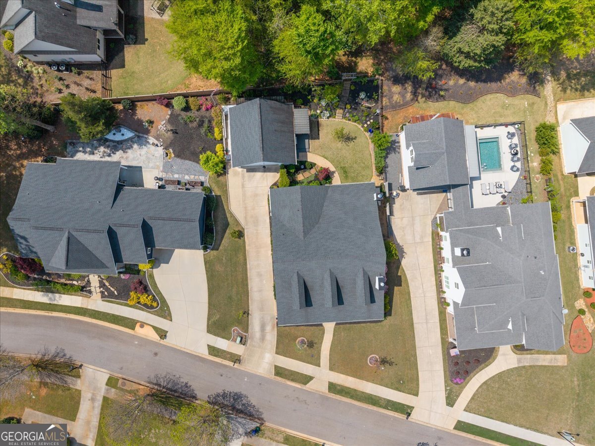 731 Markhams Drive Madison, GA 30650 - Photo 60 of 68 an aerial view of residential houses with outdoor space