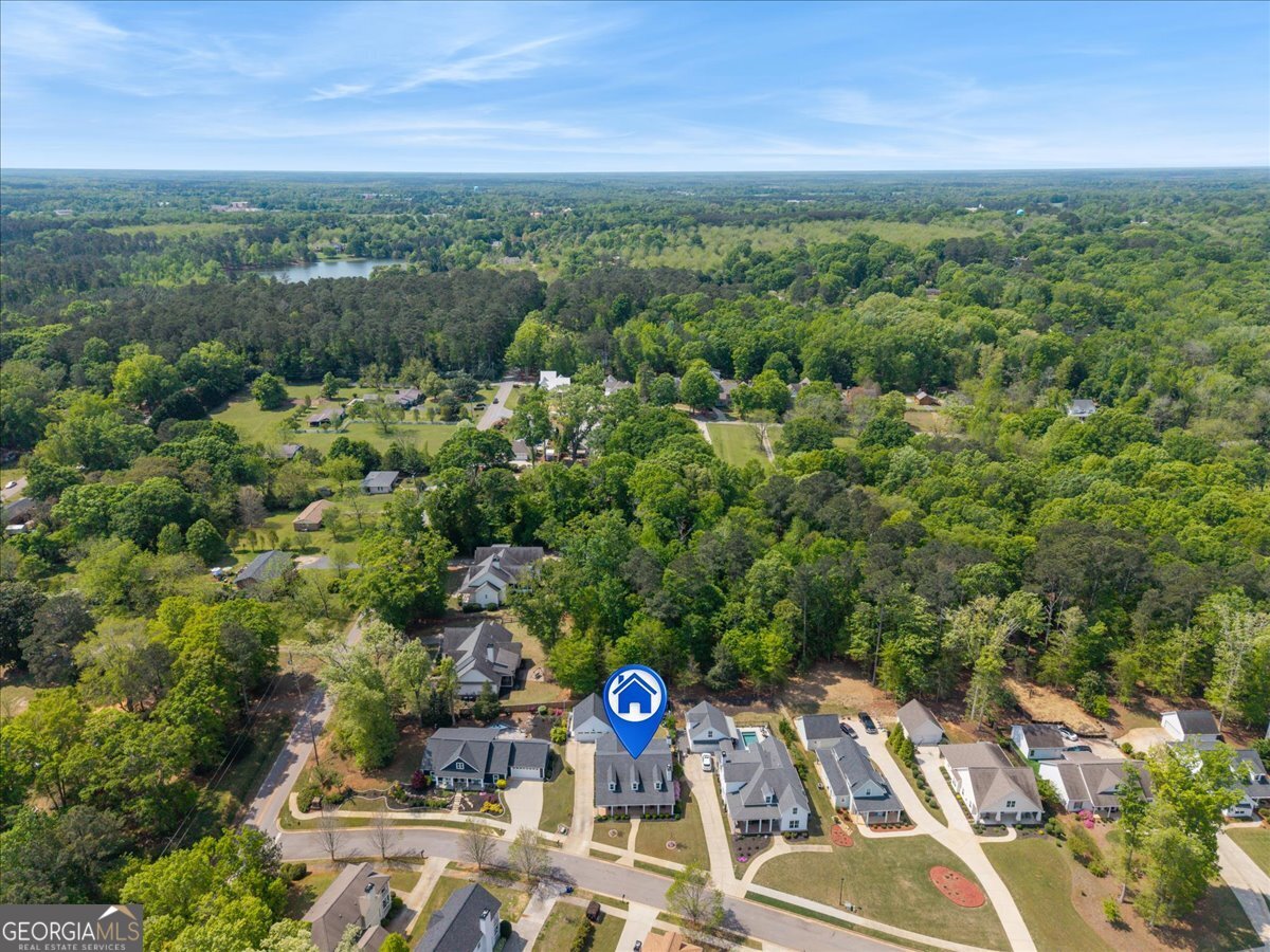 731 Markhams Drive Madison, GA 30650 - Photo 63 of 68 an aerial view of a city with lots of residential buildings