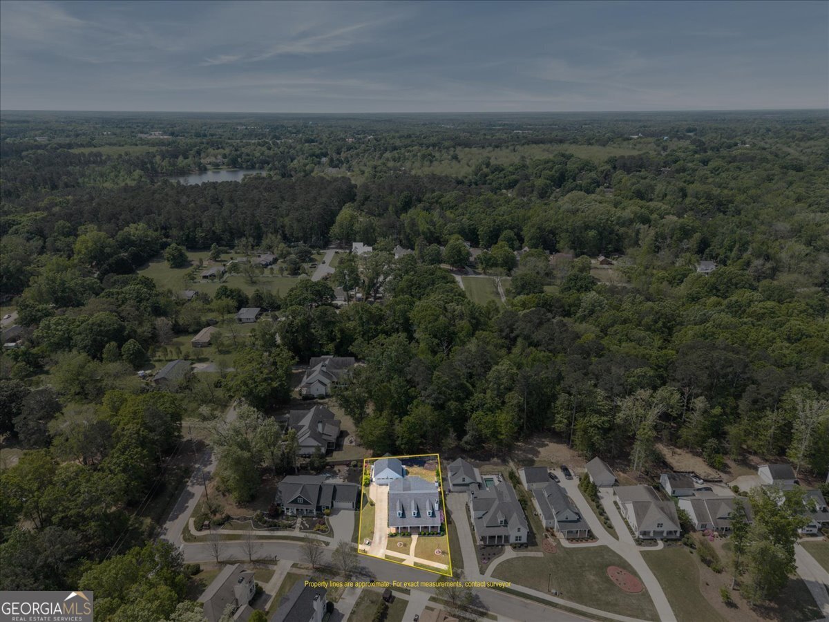731 Markhams Drive Madison, GA 30650 - Photo 64 of 68 an aerial view of a city