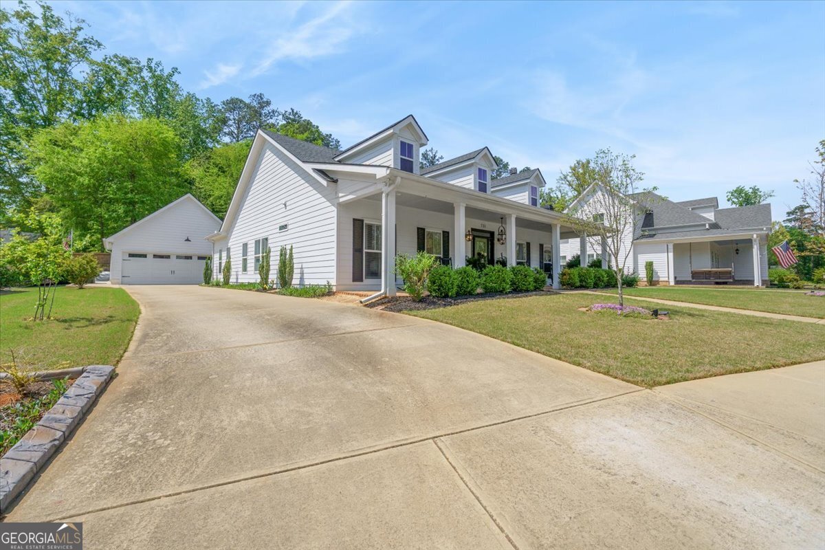 731 Markhams Drive Madison, GA 30650 - Photo 66 of 68 a view of house with a yard