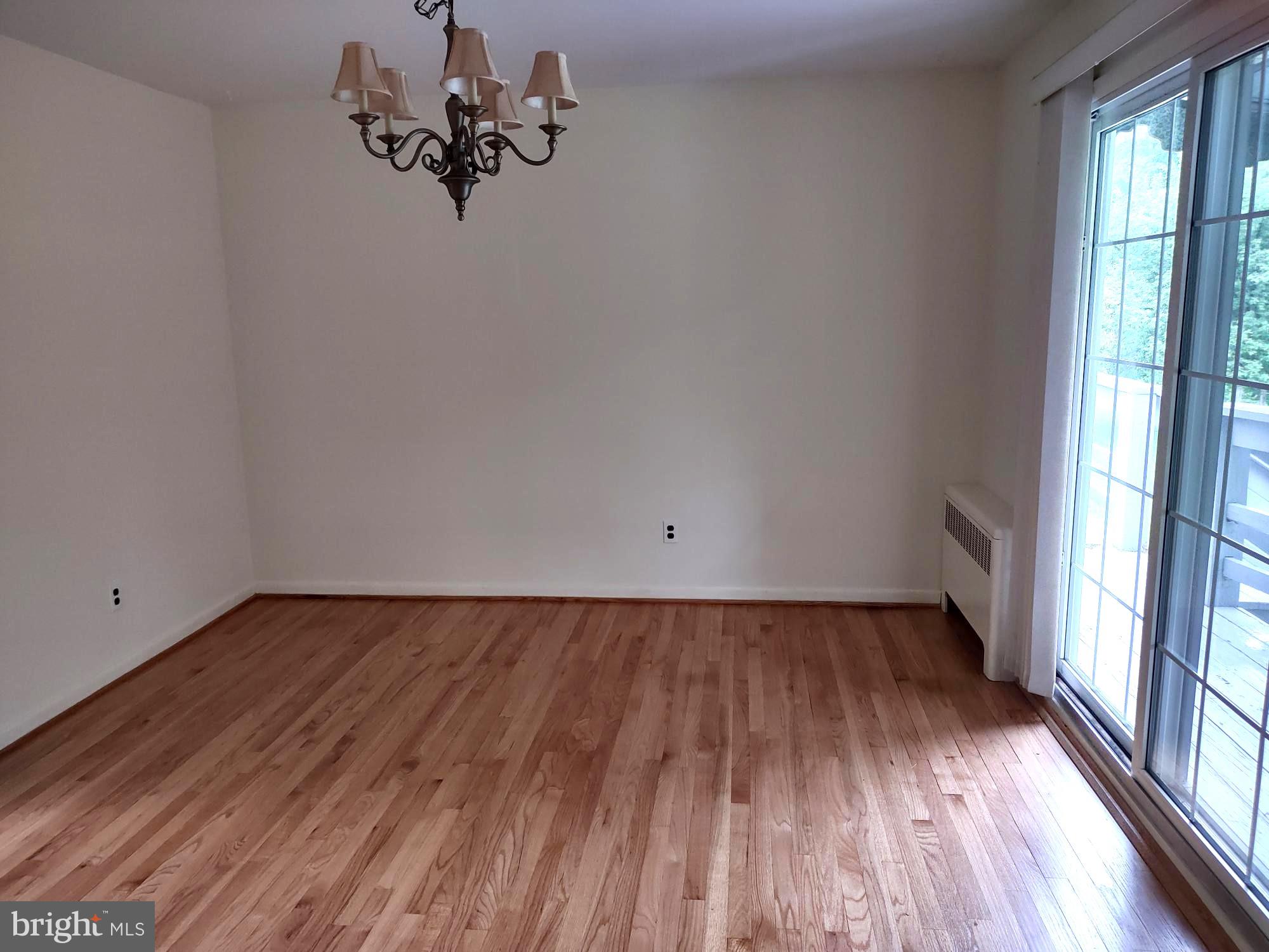 4103 Kincaid Road Baldwin, MD 21013 - Photo 16 of 73 a view of a room with wooden floor and a window