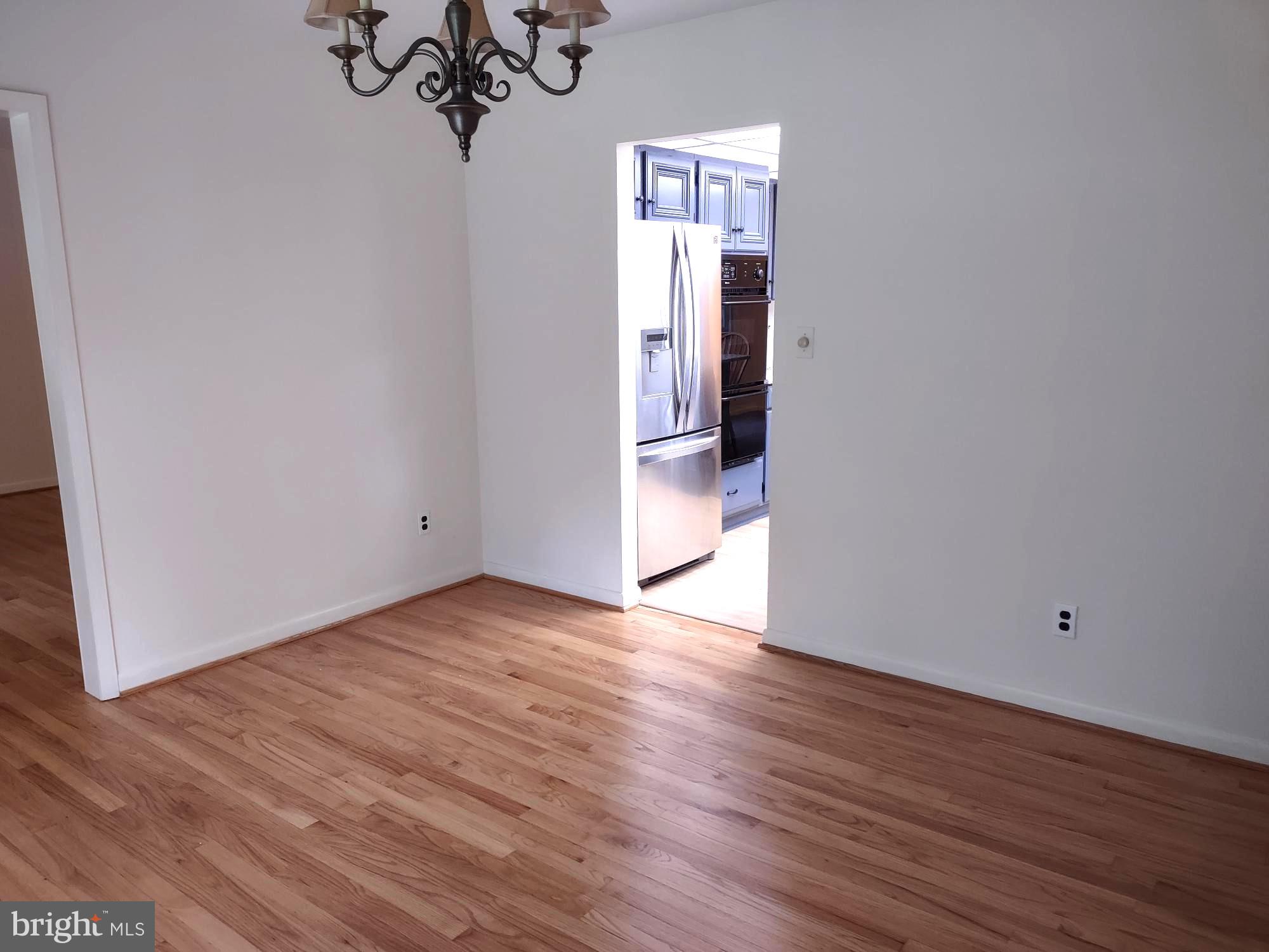 4103 Kincaid Road Baldwin, MD 21013 - Photo 17 of 73 a view of a room with wooden floor and staircase