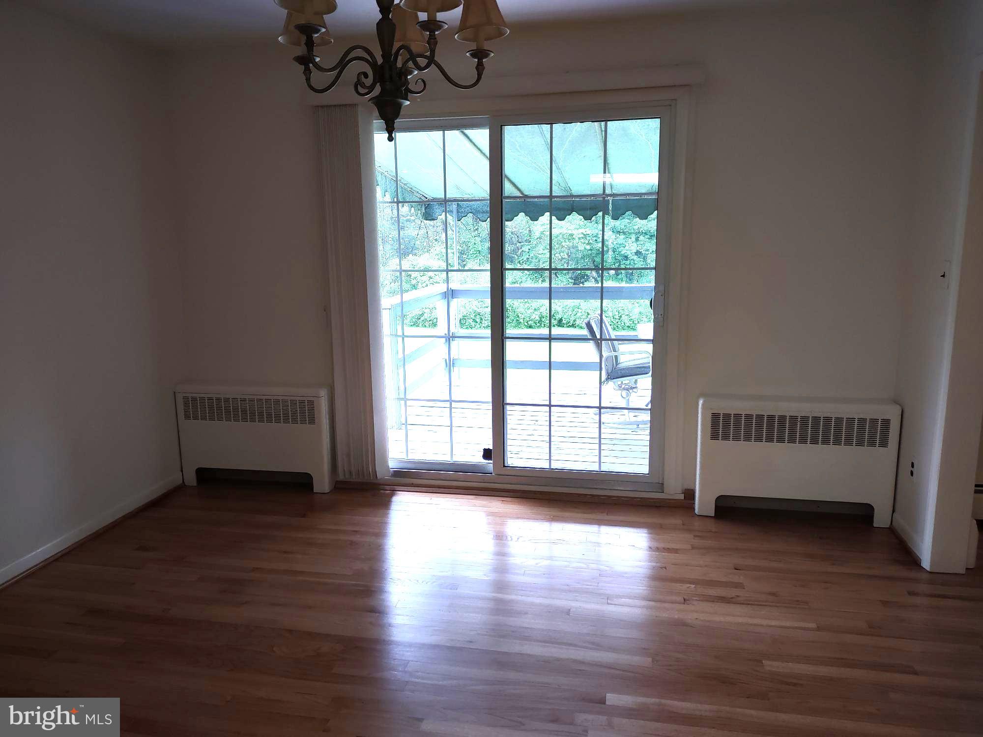 4103 Kincaid Road Baldwin, MD 21013 - Photo 19 of 73 a view of a room with wooden floor and windows
