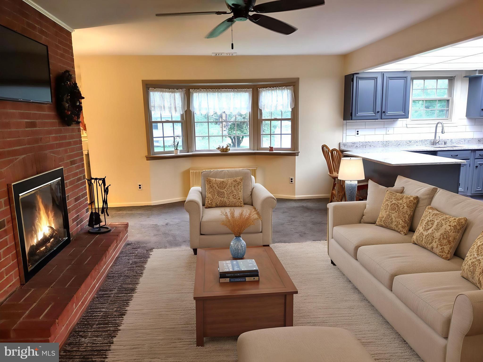 4103 Kincaid Road Baldwin, MD 21013 - Photo 30 of 73 a living room with furniture and a fireplace