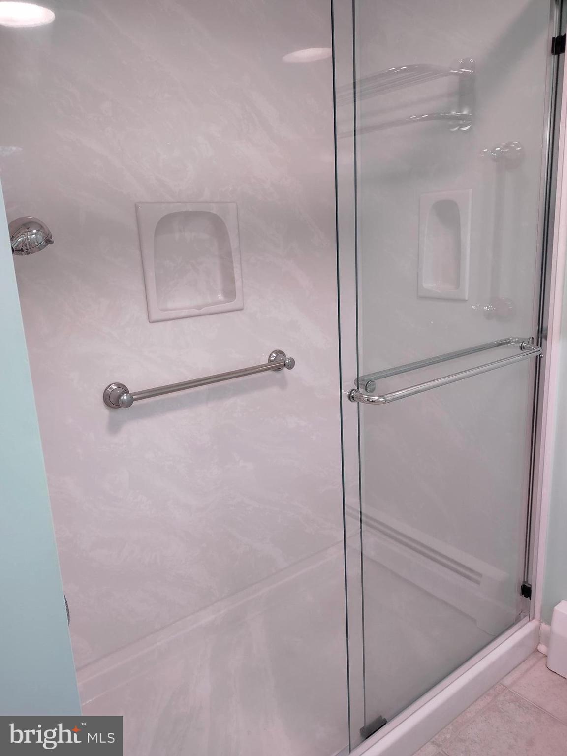 4103 Kincaid Road Baldwin, MD 21013 - Photo 40 of 73 a bathroom with a glass shower door