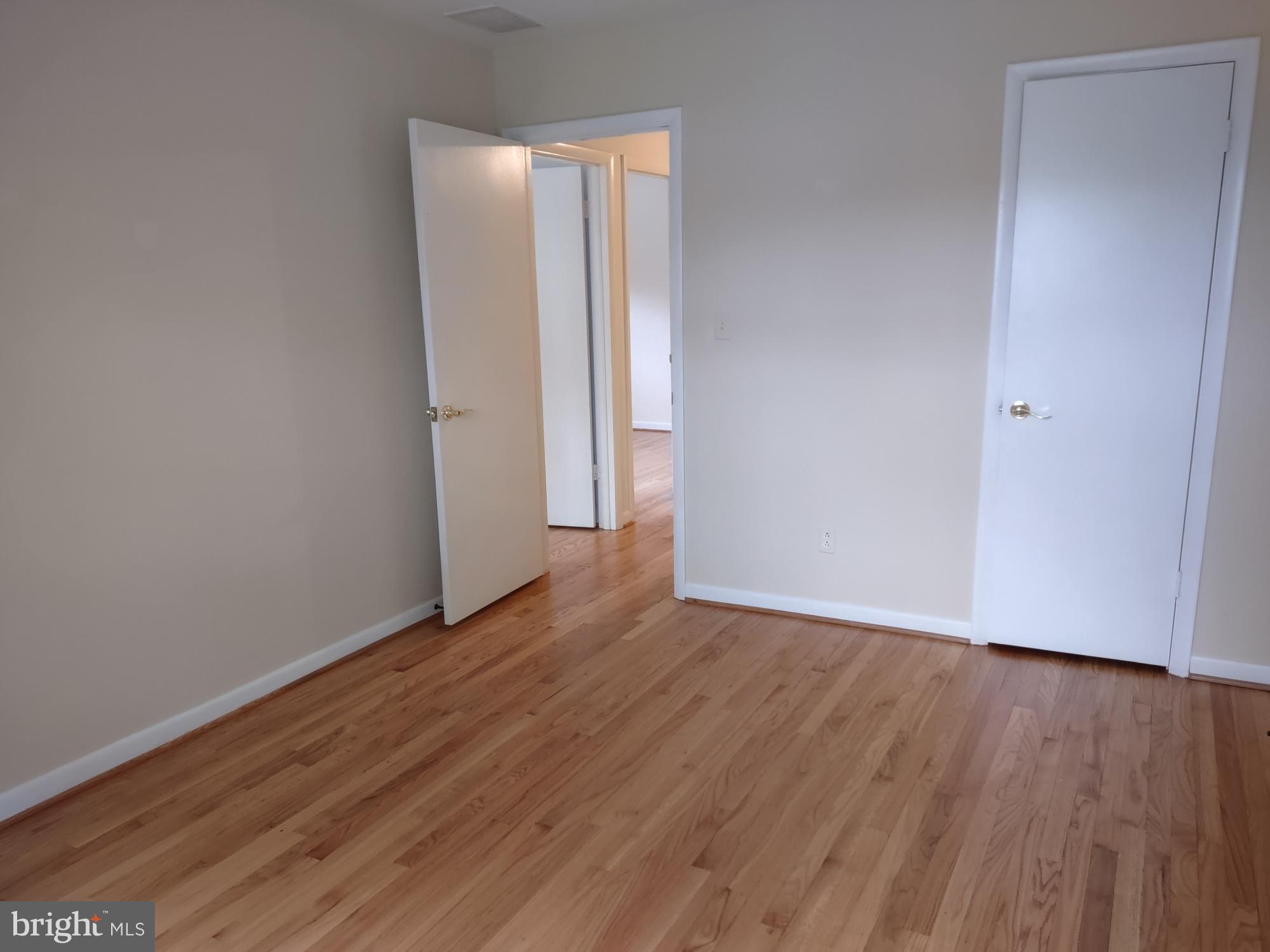 4103 Kincaid Road Baldwin, MD 21013 - Photo 43 of 73 a view of an empty room with wooden floor and a window