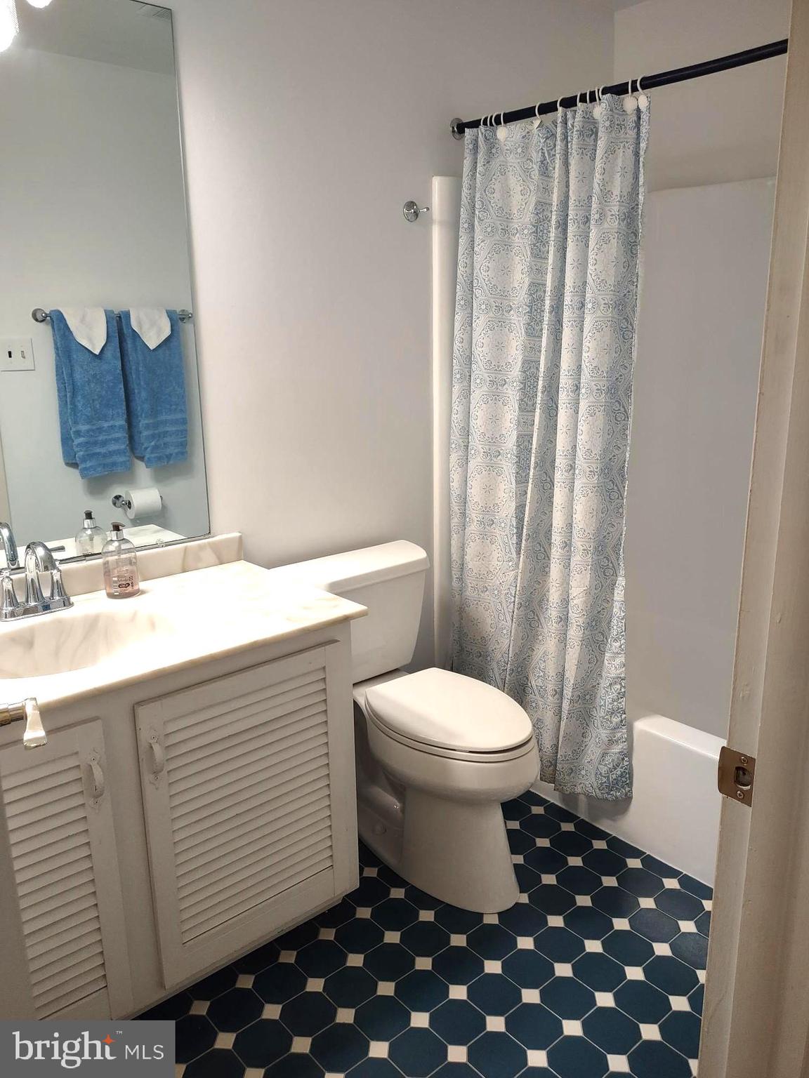 4103 Kincaid Road Baldwin, MD 21013 - Photo 52 of 73 a bathroom with a sink toilet and shower