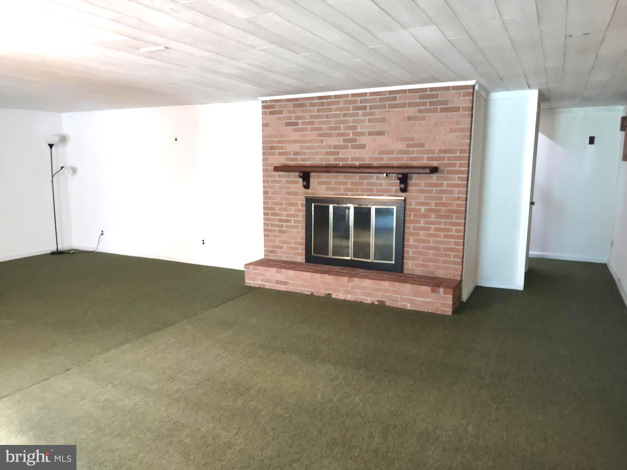 4103 Kincaid Road Baldwin, MD 21013 - Photo 60 of 73 a view of empty room with a fireplace